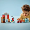 LEGO Klocki DUPLO Disney 10456 Wizyta McQueena w warsztacie Wójta